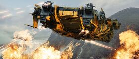 Ironclad Assault flying low over world firing weapons.jpg